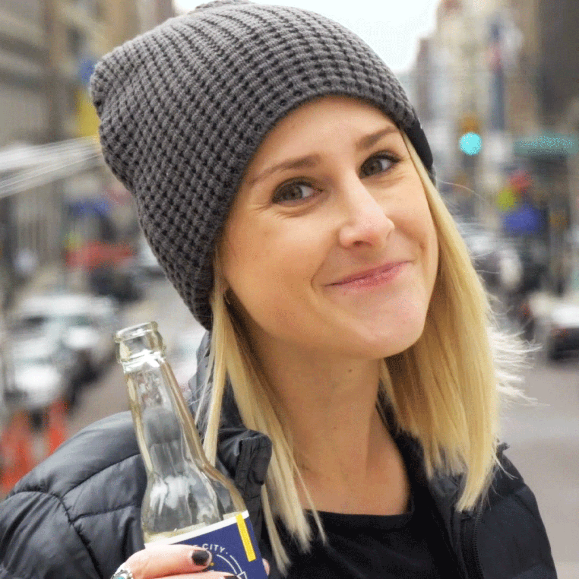 smiling girl enjoying kombucha